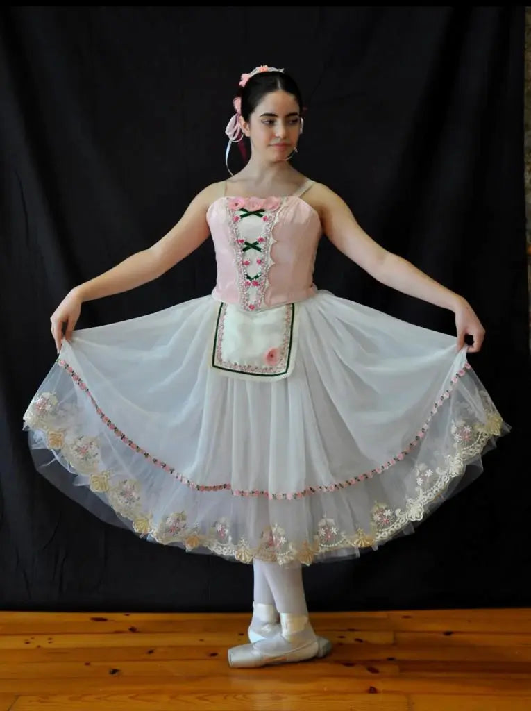 girl wearing pale pink and white tutu