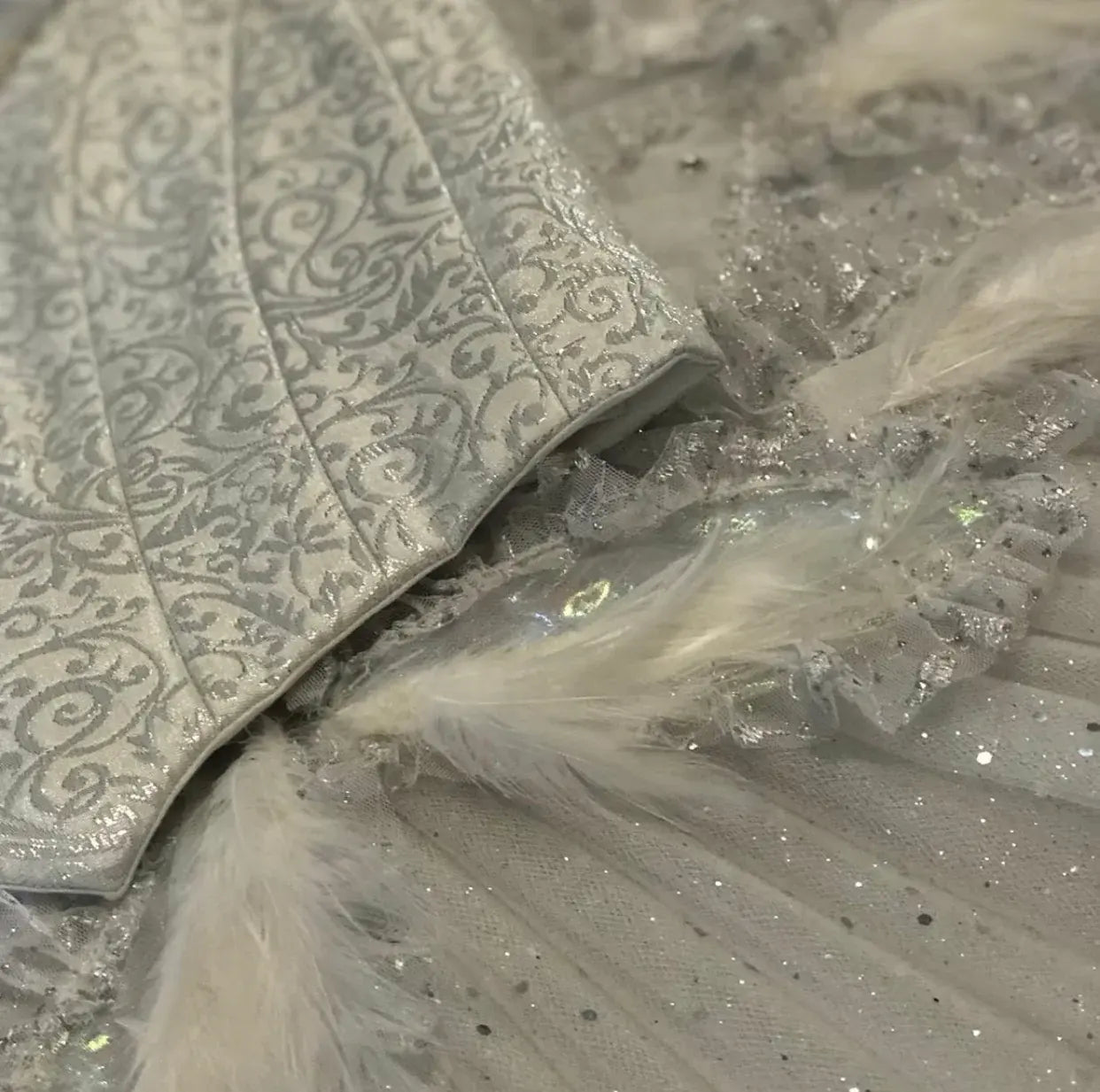 white feathers on tutu skirt