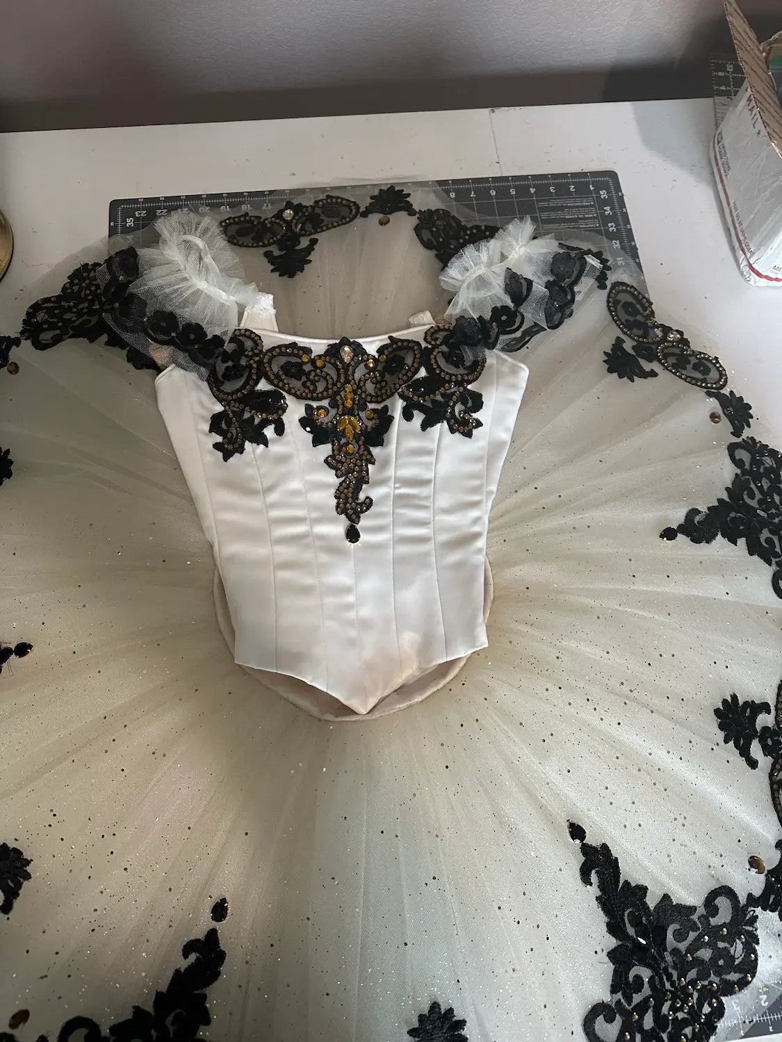 White tutu with black and gold details