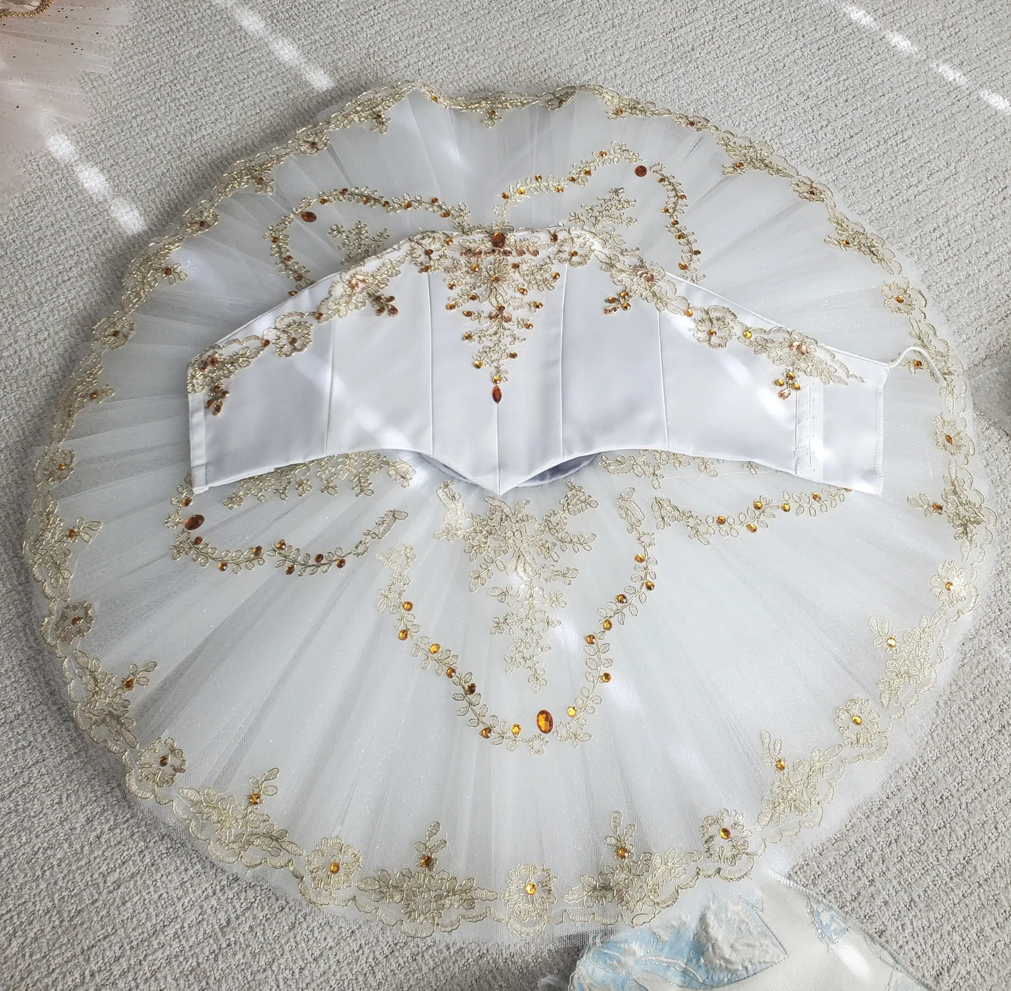 white tutu with gold stones