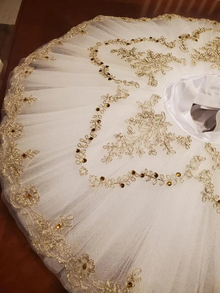 white and gold skirt tutu